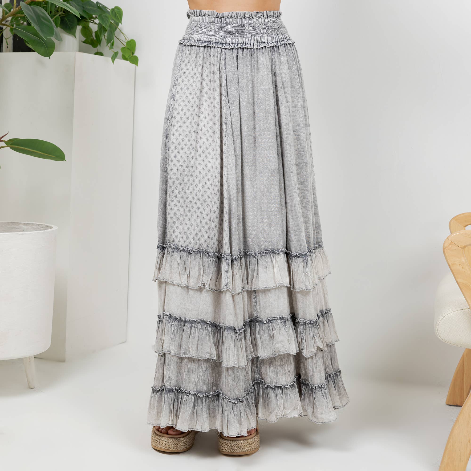 The Reverie Ruffled Tiered Maxi Skirt in Grey - front view showing smocked waist and ruffled tiers