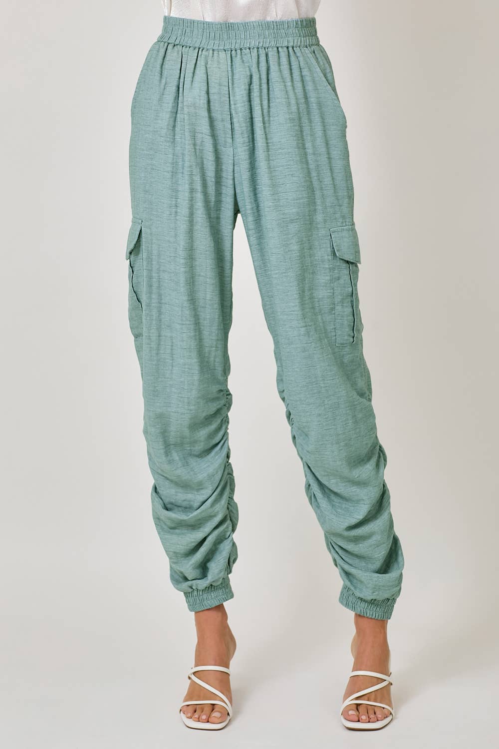 The Harper Shirred Joggers - close-up of side shirring detail and rayon-linen fabric texture