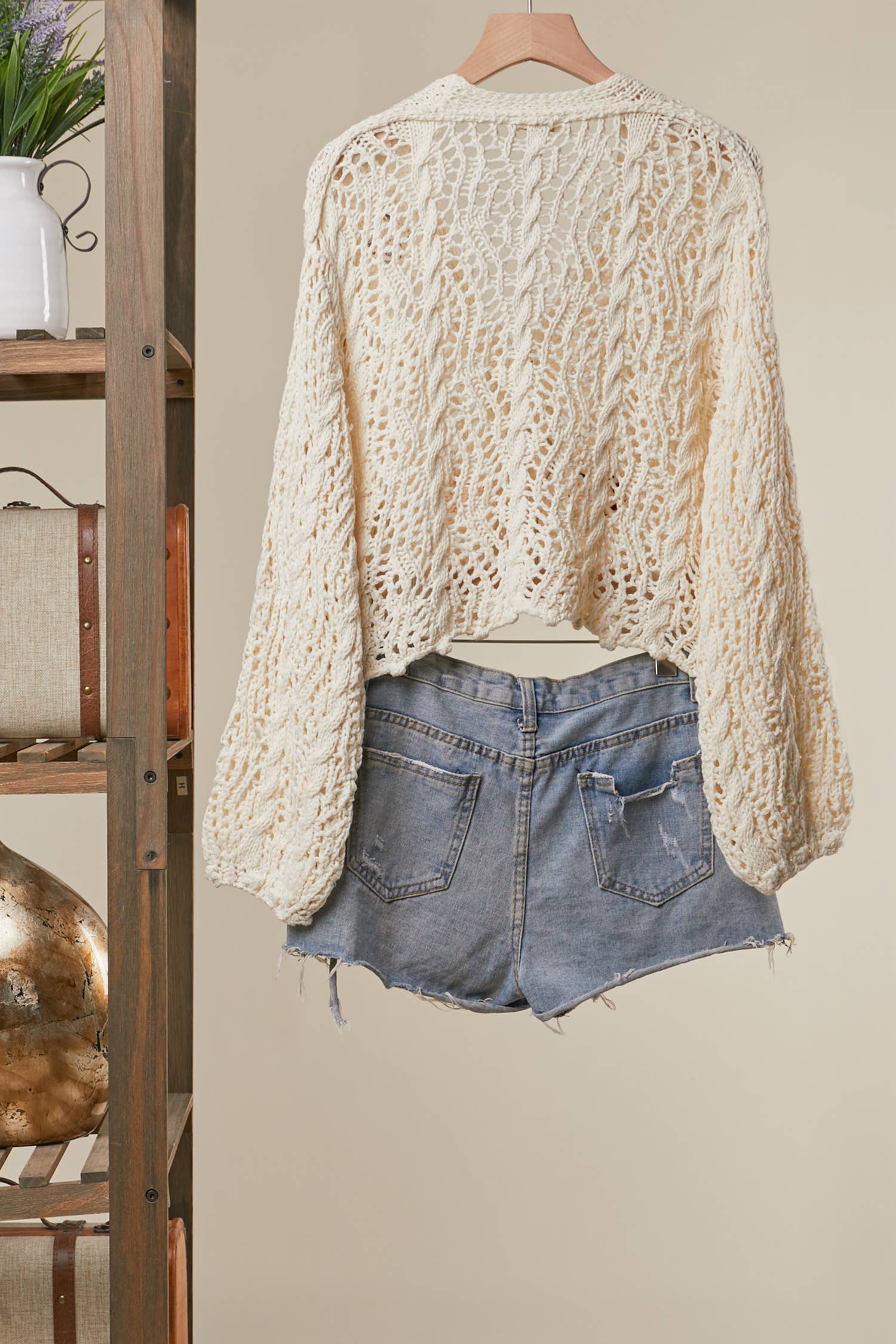 Flower Power cardigan back view - vintage-inspired crochet design with flattering relaxed silhouette