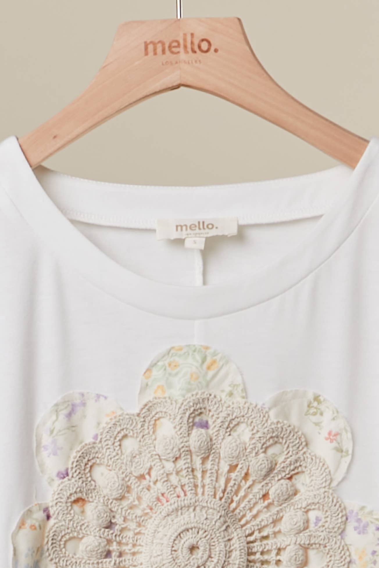 Lace embroidered top detail - close-up of delicate lace embroidery and feminine romantic design