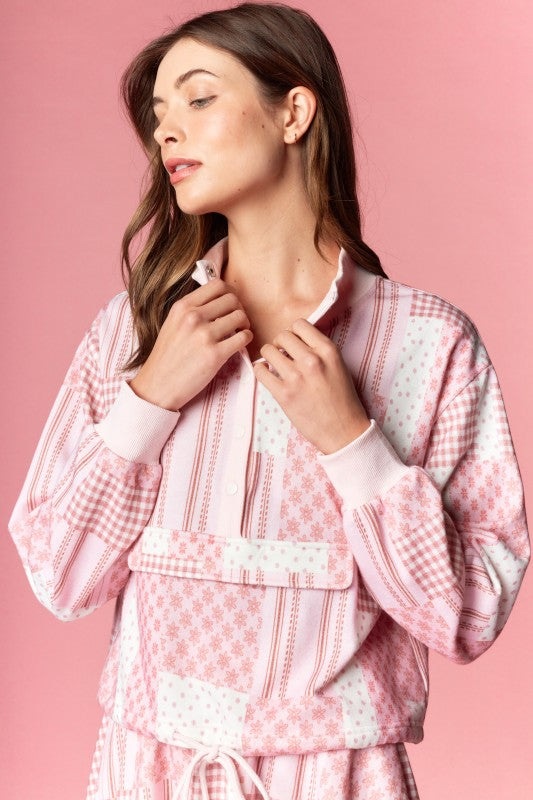 The soft fabric and relaxed fit make it as comfortable as it is stylish, while the patchwork gingham and floral patterns add a nostalgic, handcrafted feel.