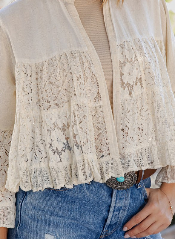 The Bohemian Breeze Lace Shrug back view showing artisan mixed lace panels and flowing silhouette