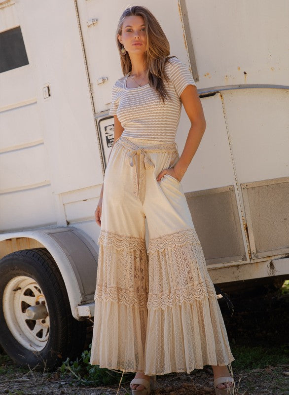 The Odyssey Tiered Wide Leg Pants - close-up of coordinated print panels and knit-to-woven contrast detail