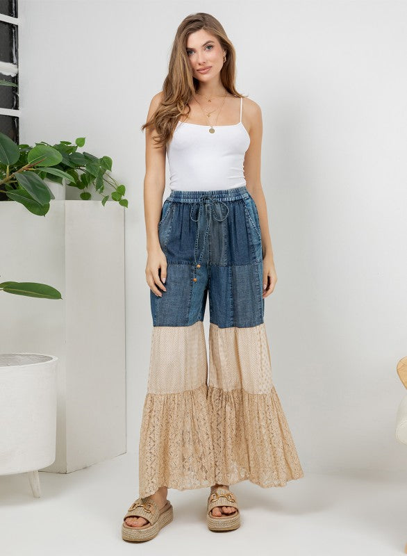 The Indigo & Lace Tiered Patchwork Pants - detail of lace inserts and mixed fabric construction