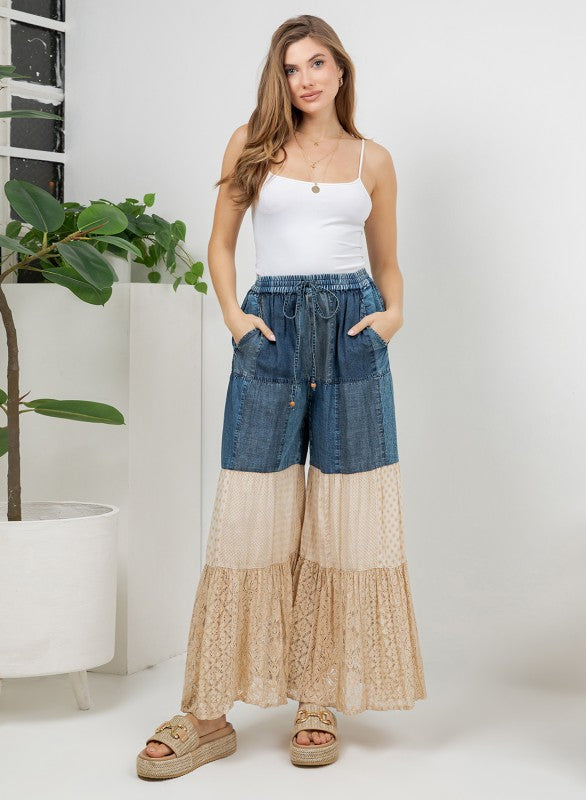 The Indigo & Lace Tiered Patchwork Pants - boho denim lace and knit patchwork pants, front view