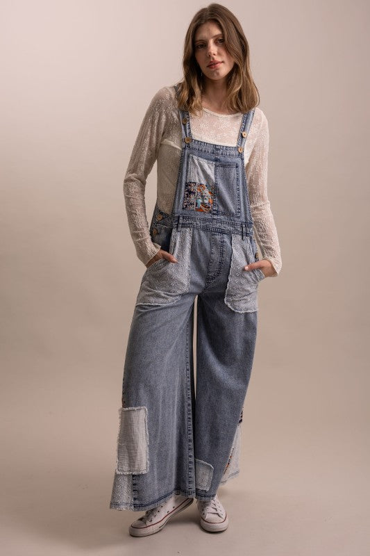 The Jeanette Overall with pockets being shown
