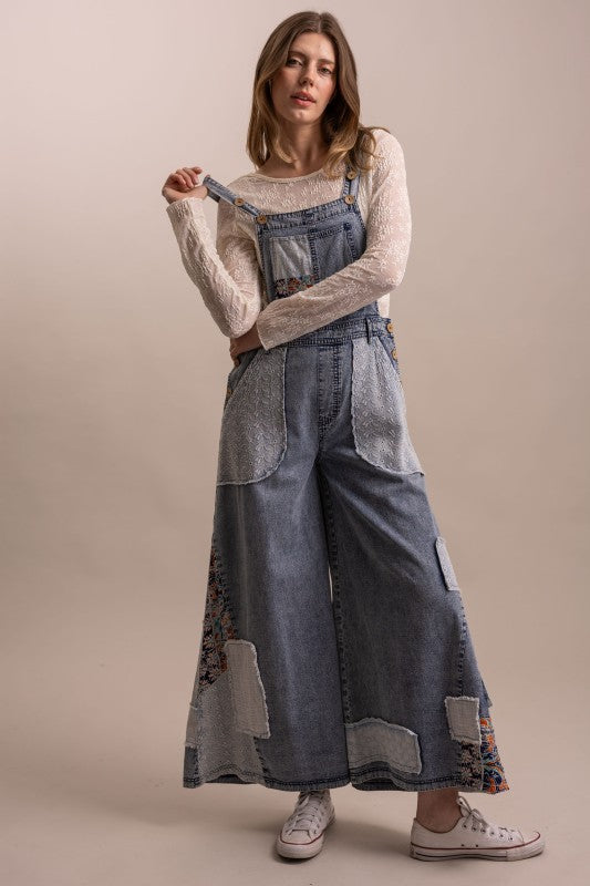 Playful photo of the Jeanette Overall showing the overall straps