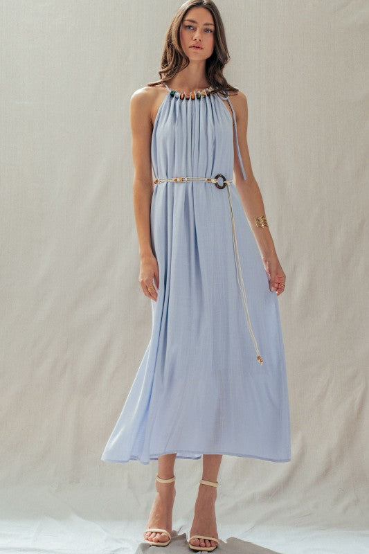 Beaded Halter Neck Linen Maxi Dress in light blue with multicolor bead neckline and rope belt, worn with strappy heels — Urban Daizy