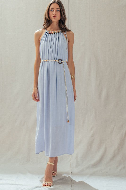 Beaded Halter Neck Linen Maxi Dress in light blue with multicolor bead neckline and rope belt, worn with strappy heels — Urban Daizy