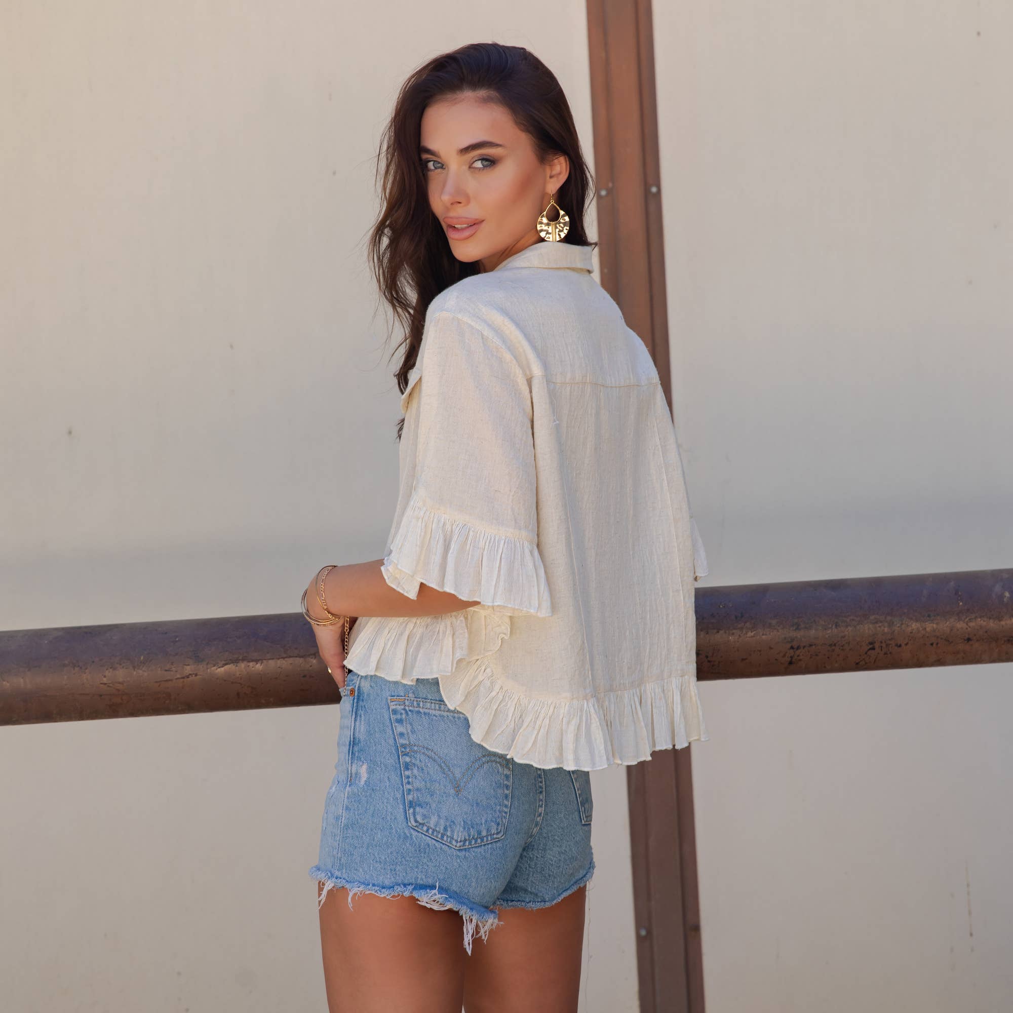 The Rebel Cropped Denim Shirt - back view of button-down crop shirt with mixed panels