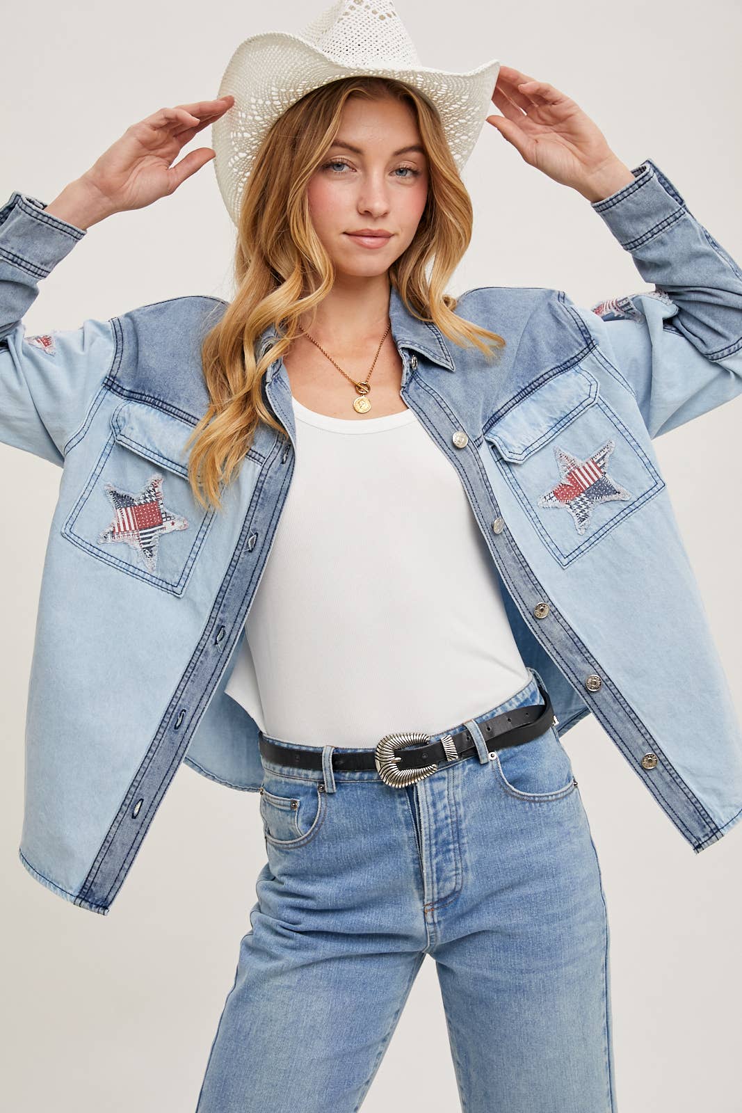 Two-tone denim button-down jacket featuring patriotic star appliqués on pocket and sleeve