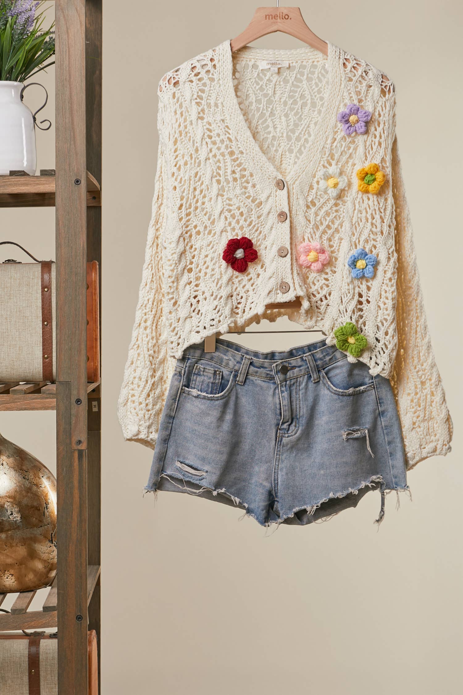 Flower Power crochet cardigan - front view showing intricate floral crochet design with button-front closure