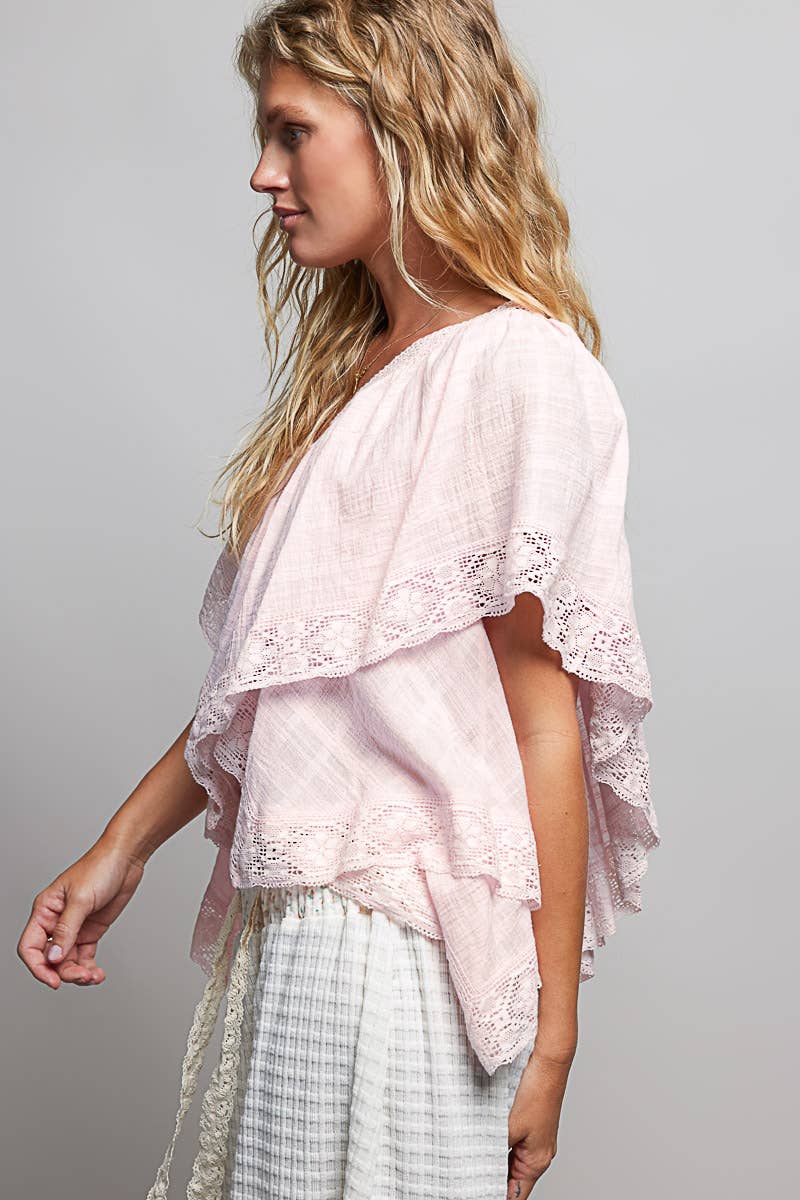Side view Pink reversible embroidered lace trim ruffle top — boho-luxe style