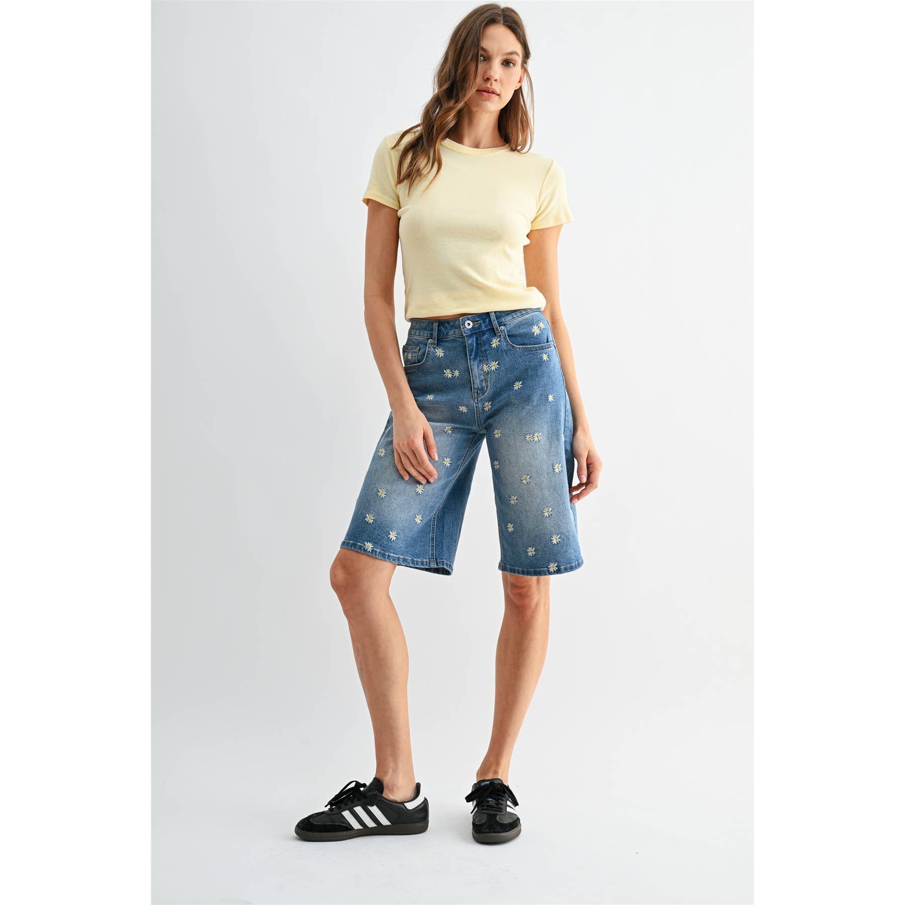 Woman wearing Daisy Field Bermuda Short by Mica Denim