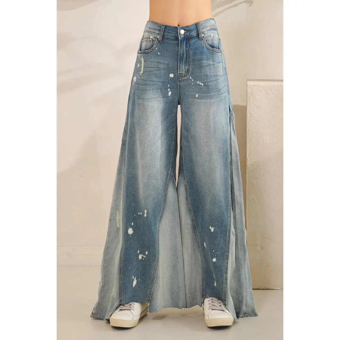 Paint Splatter Wide Leg Flare Jeans - front view showing high-rise waist, paint splatter distressing and dramatic godet flare panels in medium blue wash