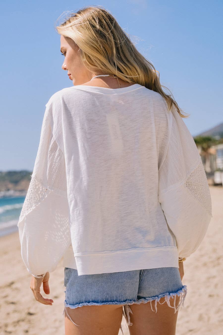 Back view Plus size slub jersey long sleeve pullover in off white with lace trim and raw edge seam detail — boho-luxe women's top by Spirit & Wind Boutique