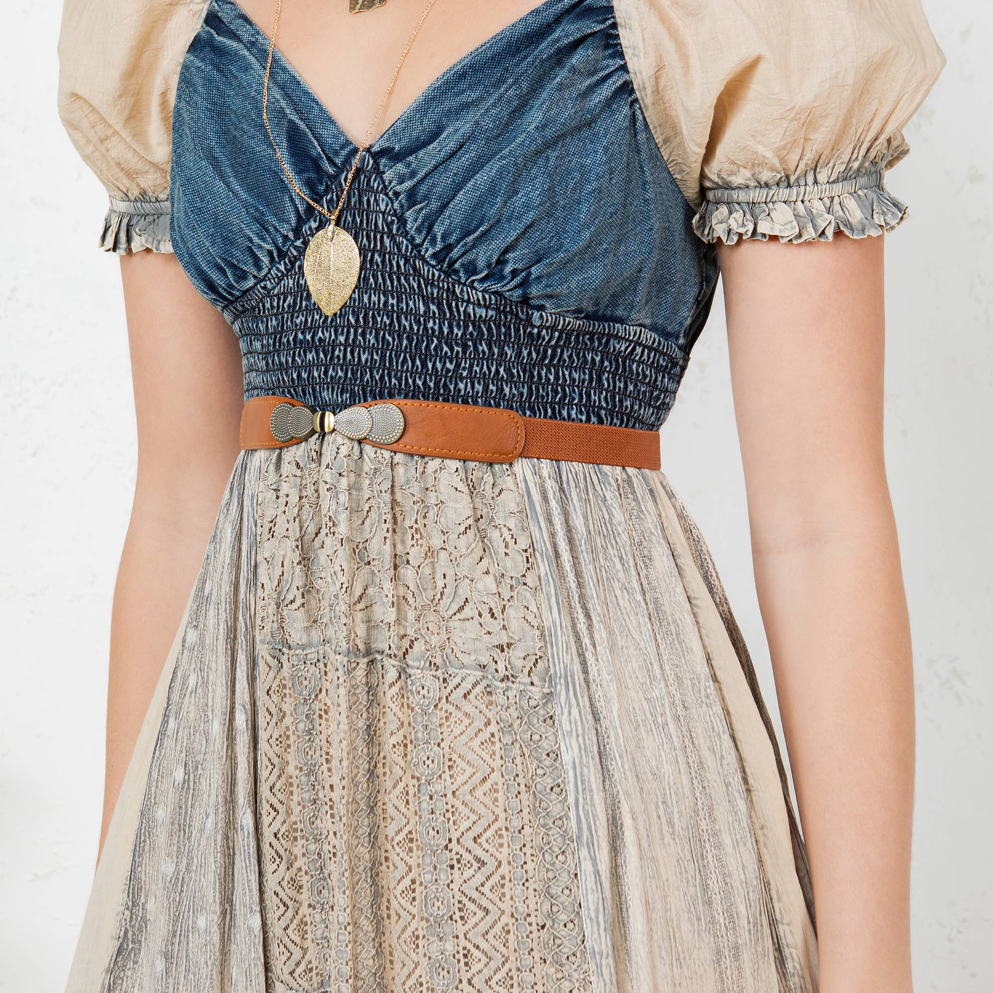 The Wildflower Sweetheart Patchwork Dress - close-up of artisan denim patchwork and cotton check details