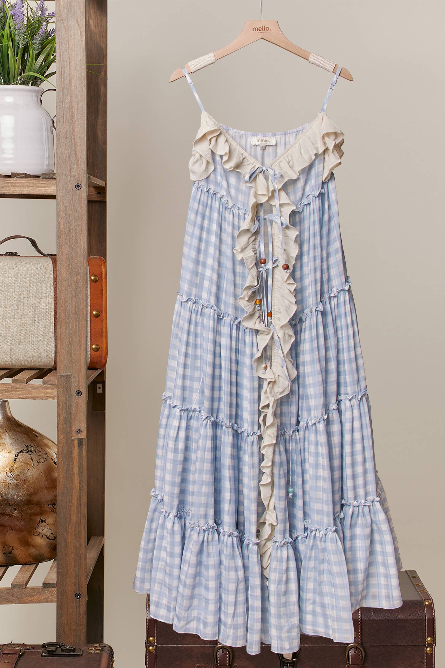 The LoLa ruffle cardigan dress in blue - front view showing cascading ruffles and flowing yards of fabric