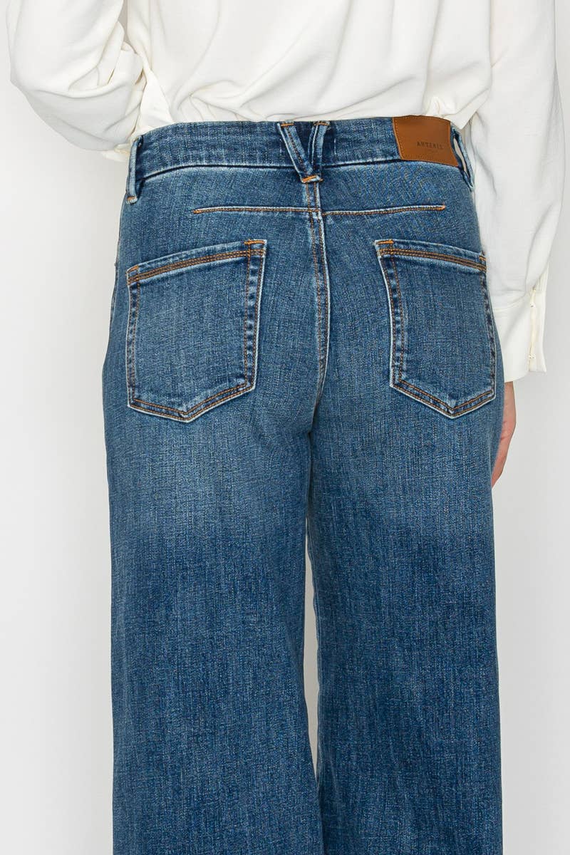 Wide-leg palazzo jeans back view - back dart detailing with relaxed flowing silhouette and wide hem