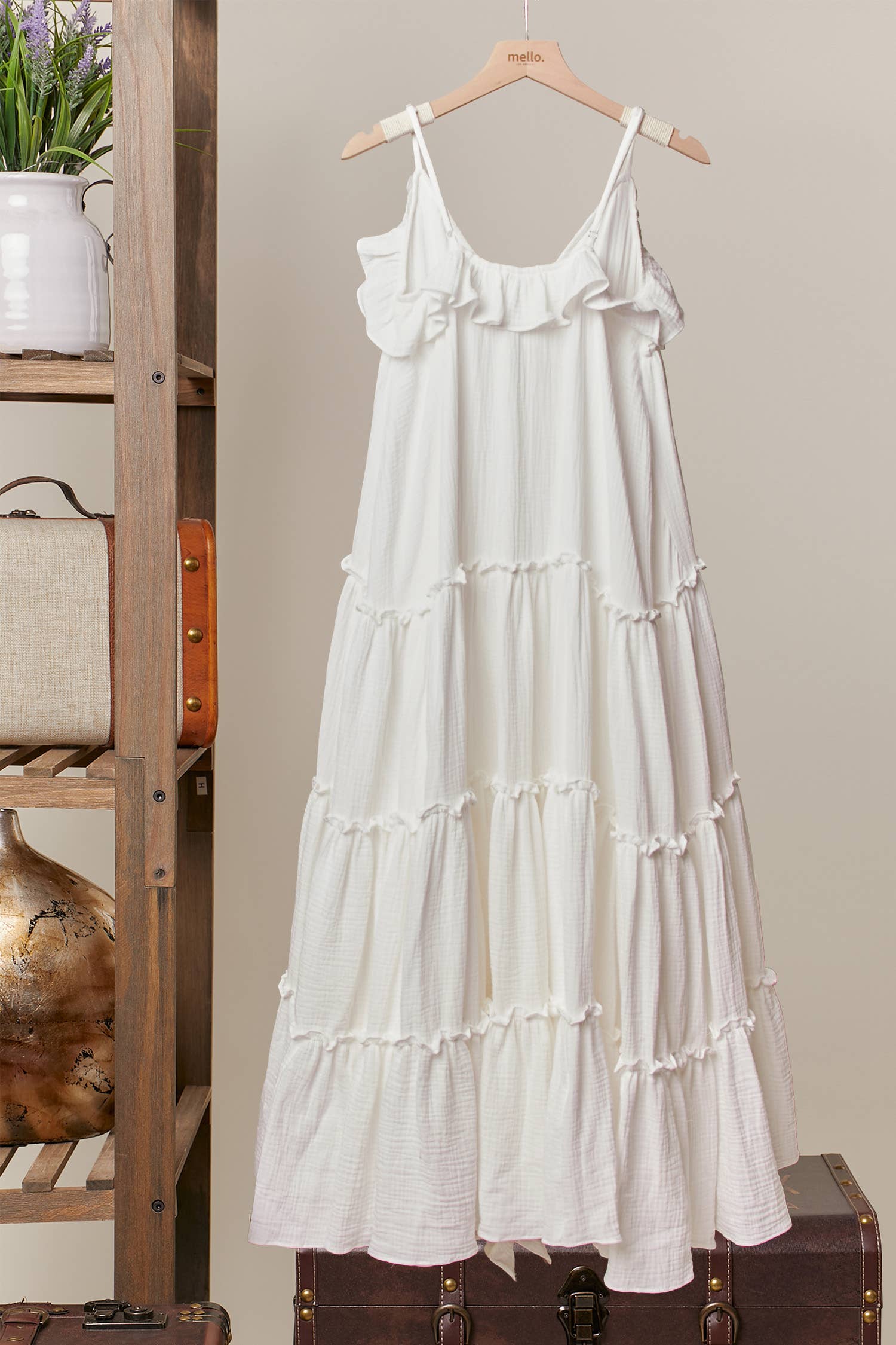 Ruffle cardigan dress back view - yards of flowing cream fabric with cascading ruffle detailing