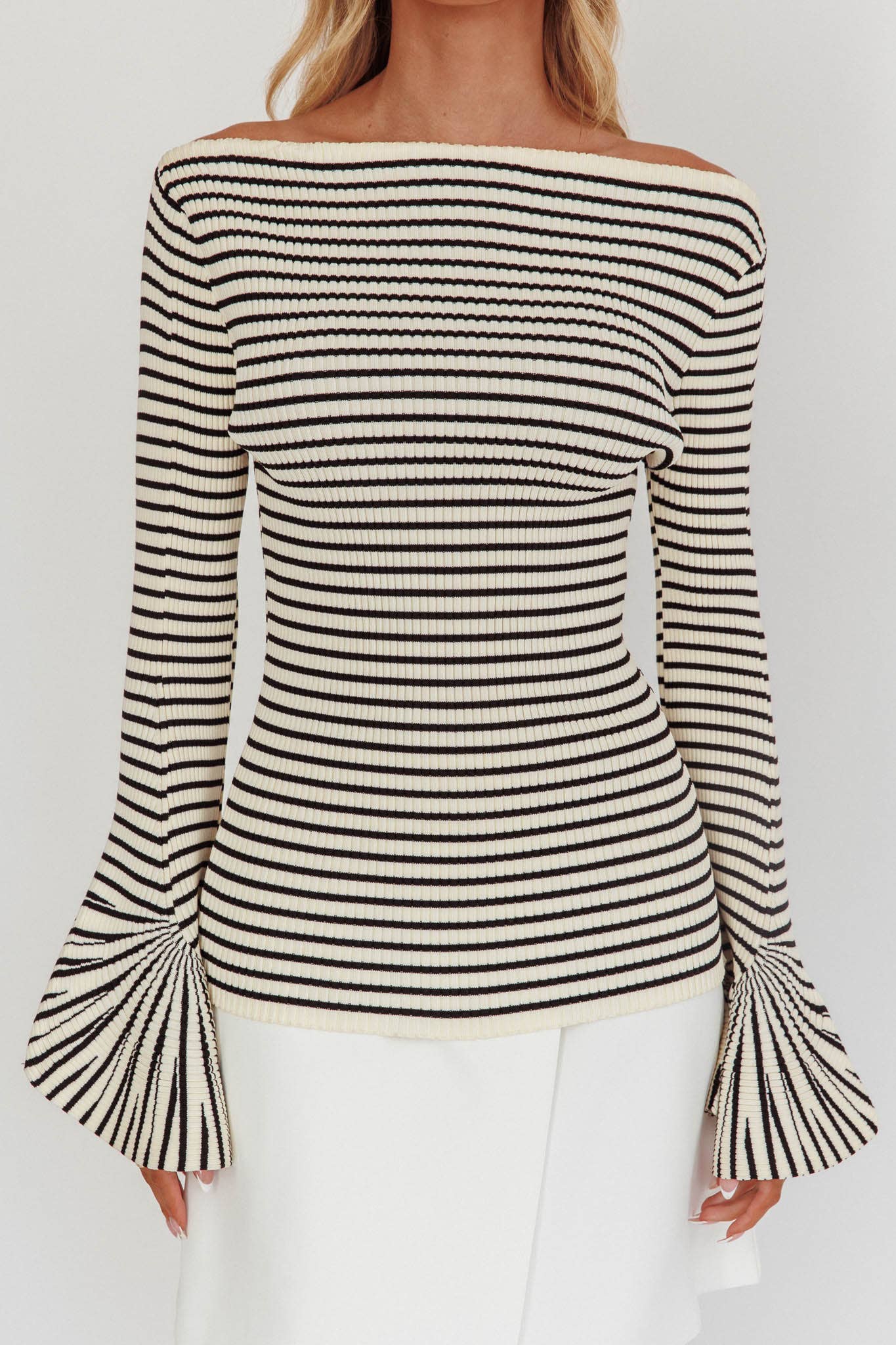 Black-and-ivory horizontal stripe sweater, ribbed, long sleeves with flare