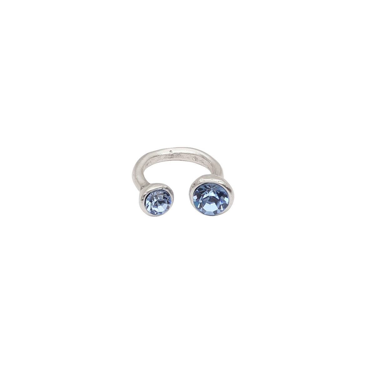 A silver-toned open hoop ring featuring two round bezel-set light blue gemstones, shown against a plain white background.
