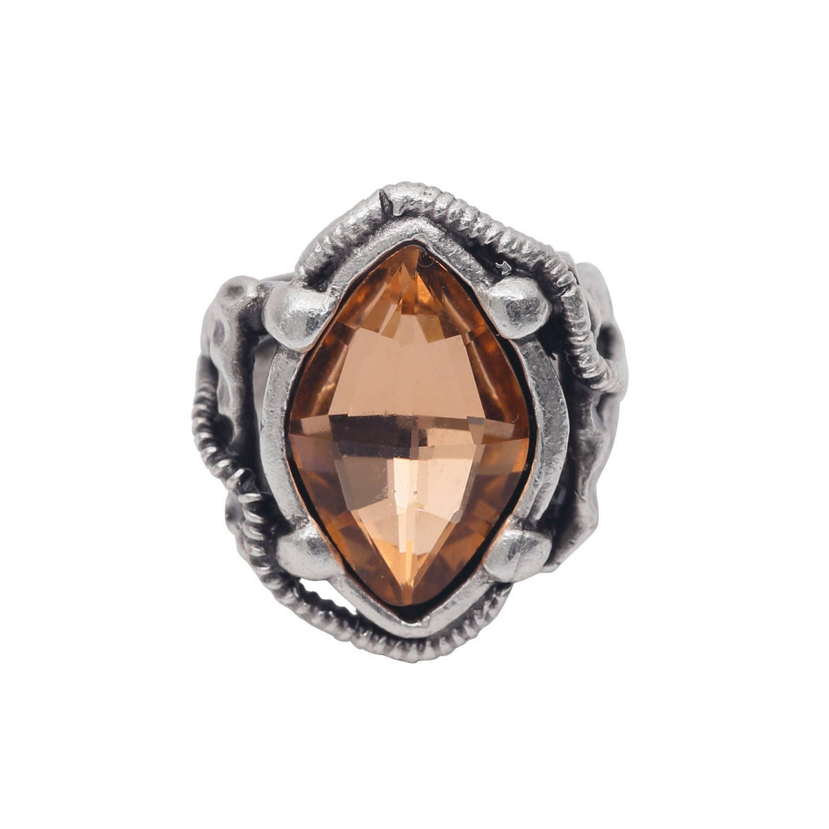 Silver ring with a marquise-shaped brown gemstone on a white background