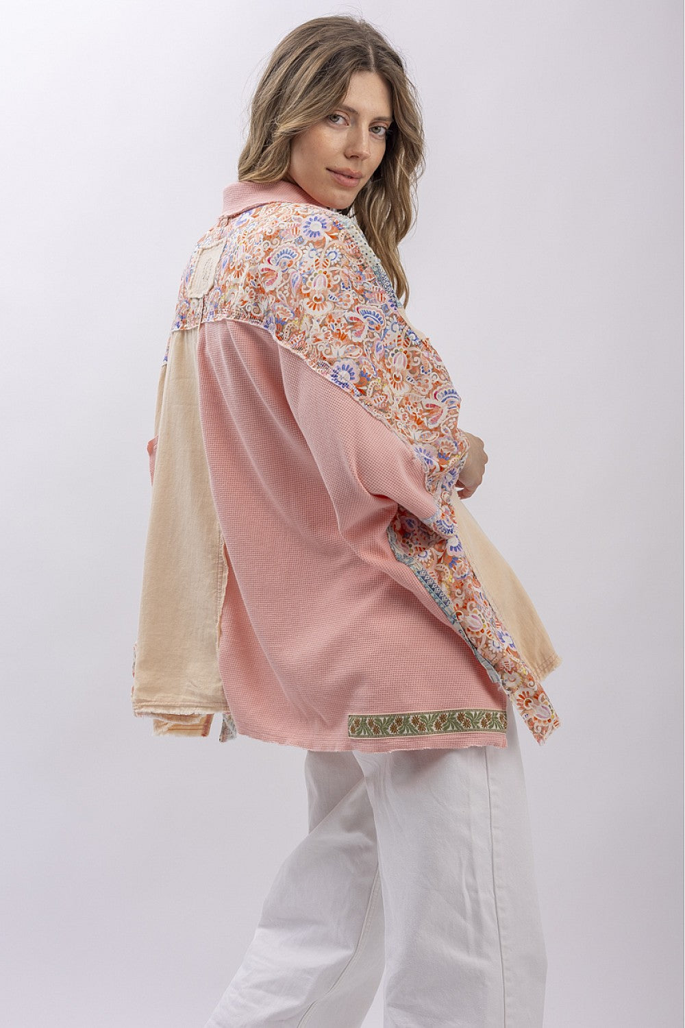 The Patchwork Garden Shirt back view showing raw edge details and patchwork panel arrangement