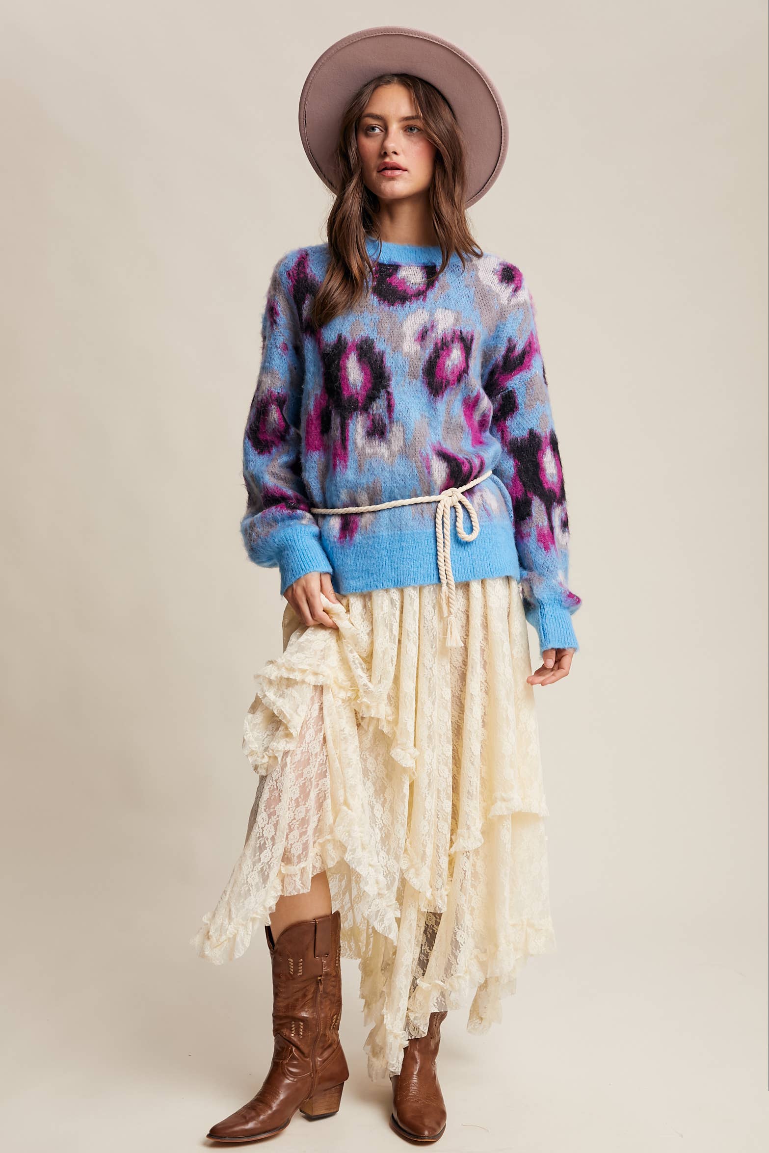 Full body View Women’s fuzzy abstract leopard knit pullover sweater with soft textured fabric and bold animal print — cozy statement top for modern chic outfits.