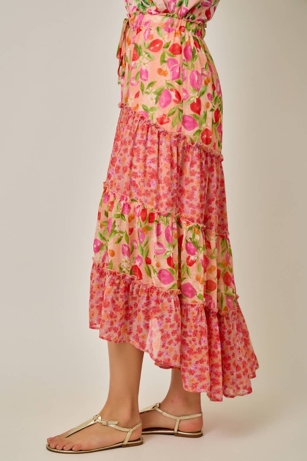 Floral tiered dress on a plain background