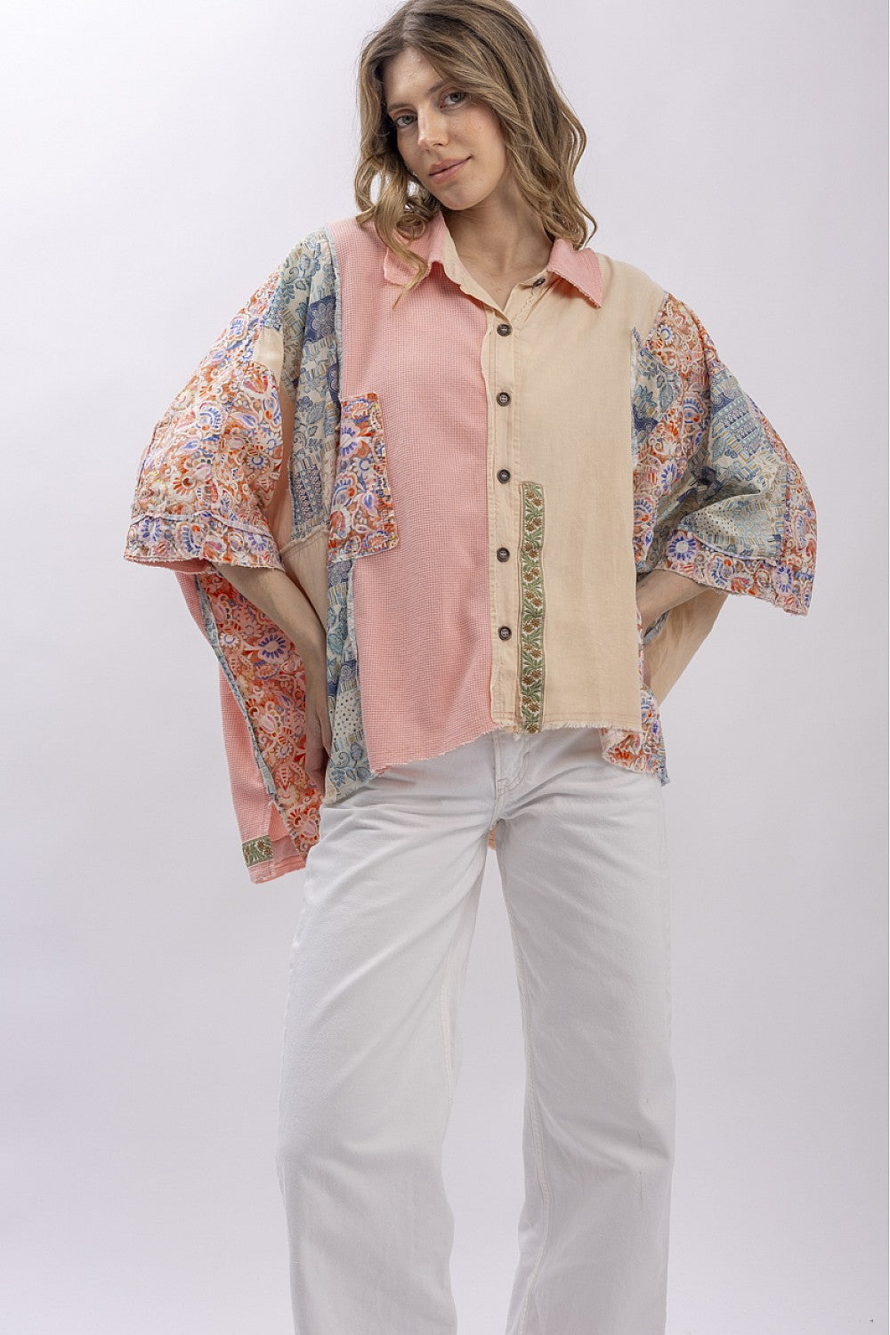 The Patchwork Garden Shirt - multi-fabric patchwork shirt with floral, gingham, and solid panels, front view