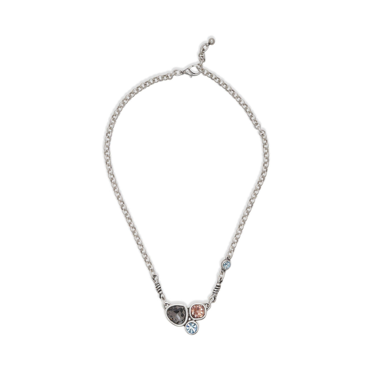 Necklace with three small gemstones on a white background