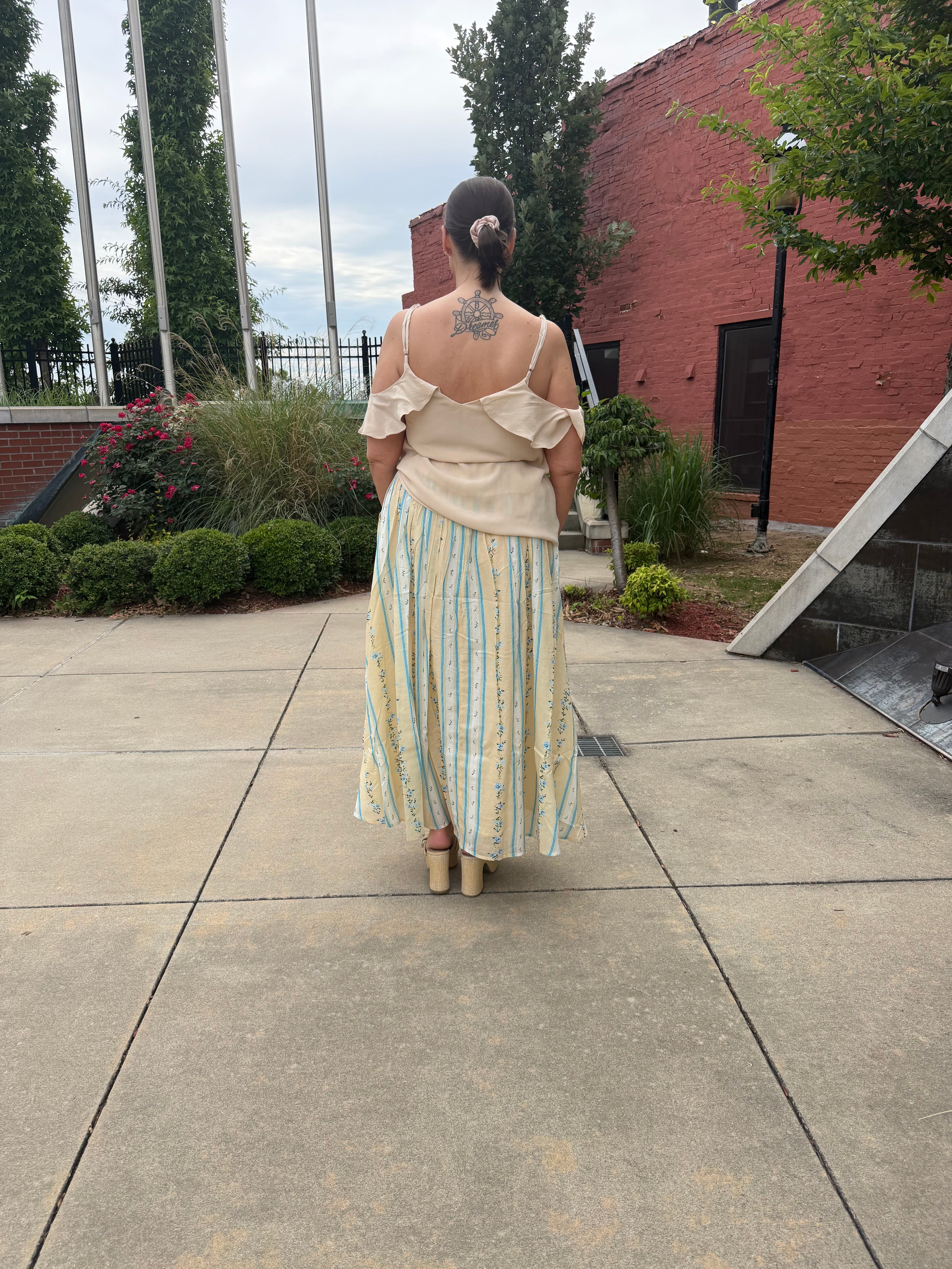 Juliet's Romantic Midi Skirt – decorative button front, tie-front detail, back view