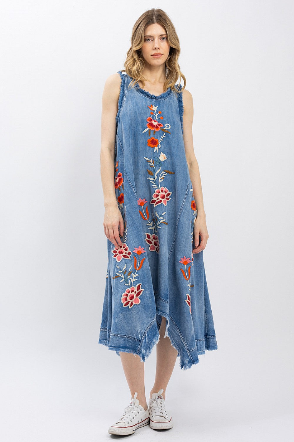 The Indigo Wildflower Dress side view showing mid-length loose fit and wide hem silhouette