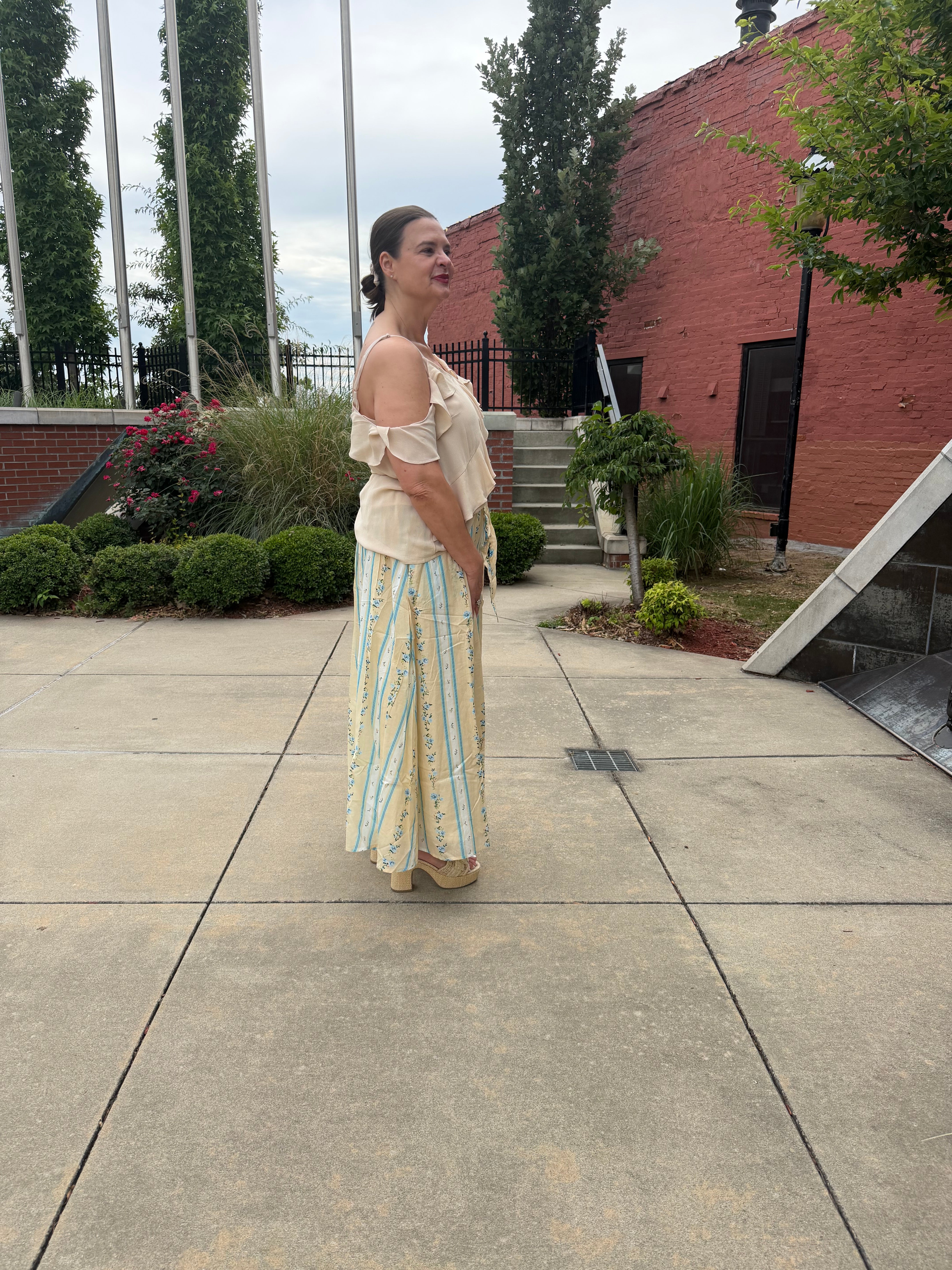 Juliet's Romantic Midi Skirt – decorative button front, tie-front detail, side view