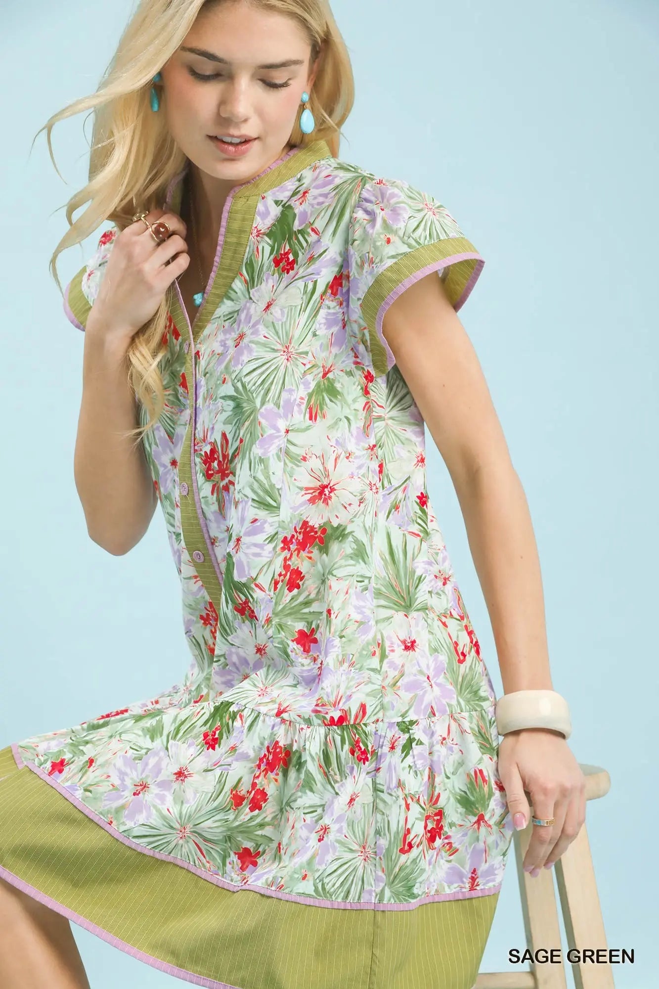 Tropical Floral Tiered Dress - side view showing tiered midi silhouette, flutter sleeve, and flowing 100% cotton tropical floral fabric
