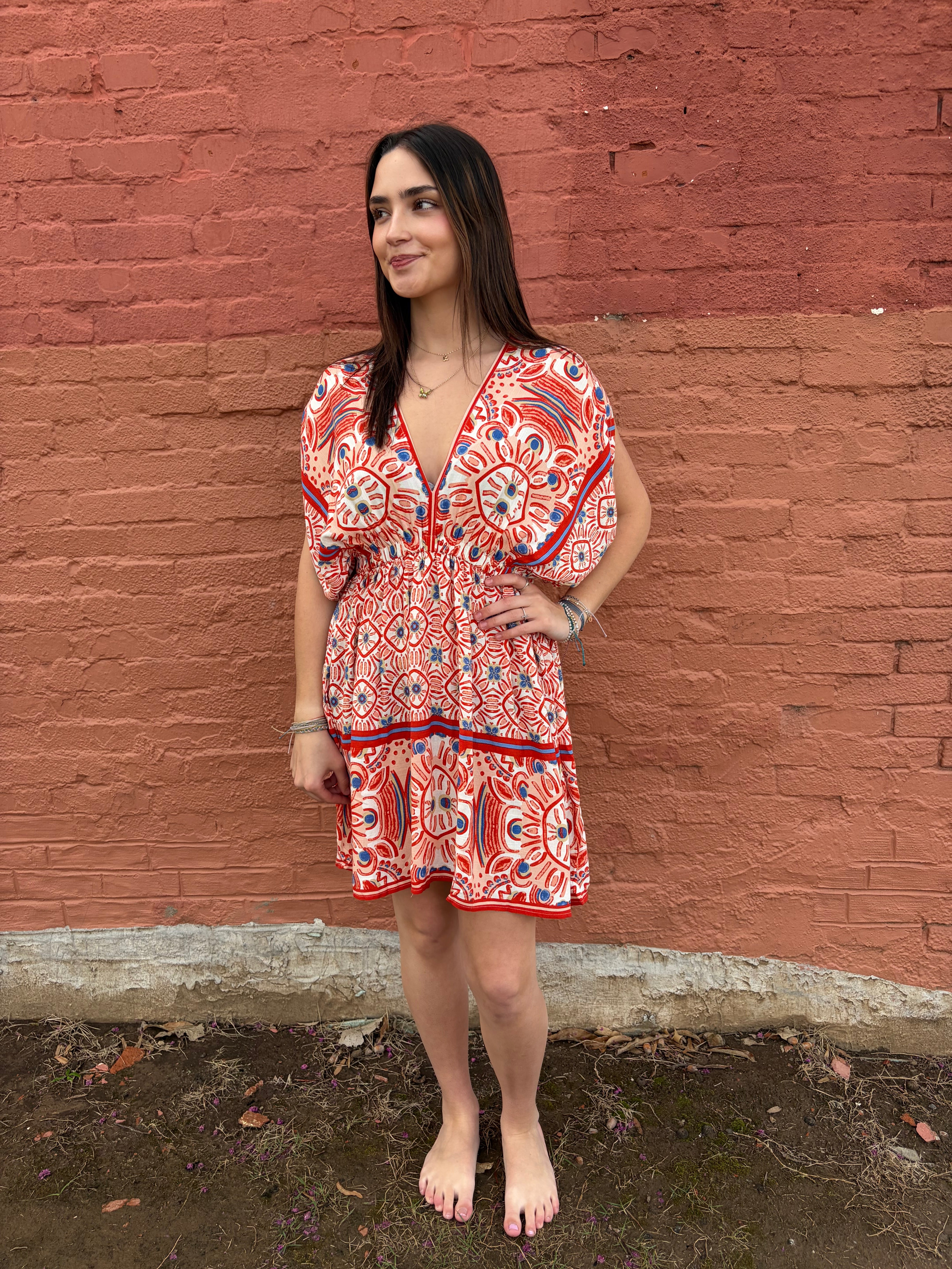 Front view of model wearing the red pattern Haydee Mini Dress