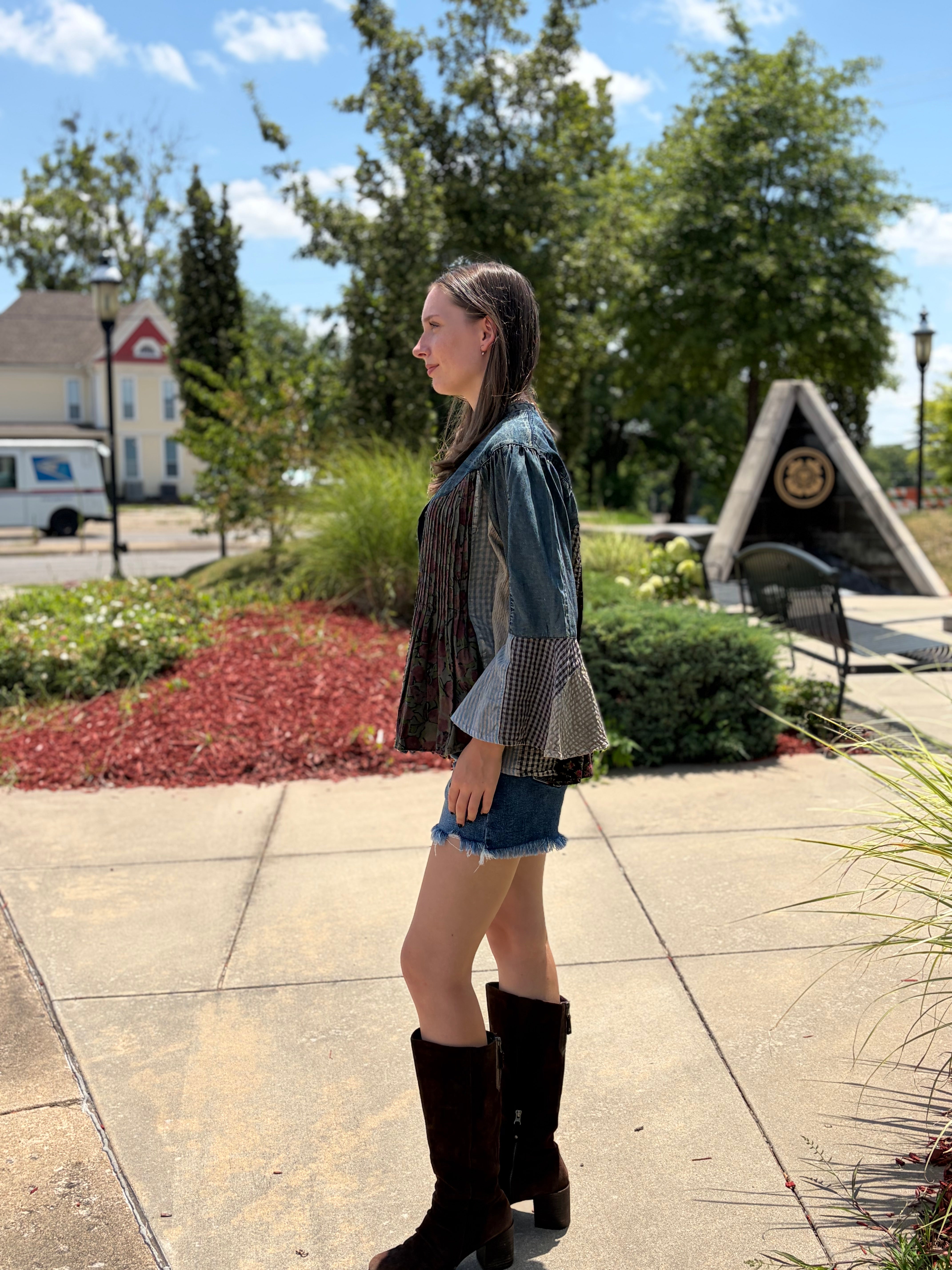 Outdoor side profile, mixed floral patchwork, tall black boots