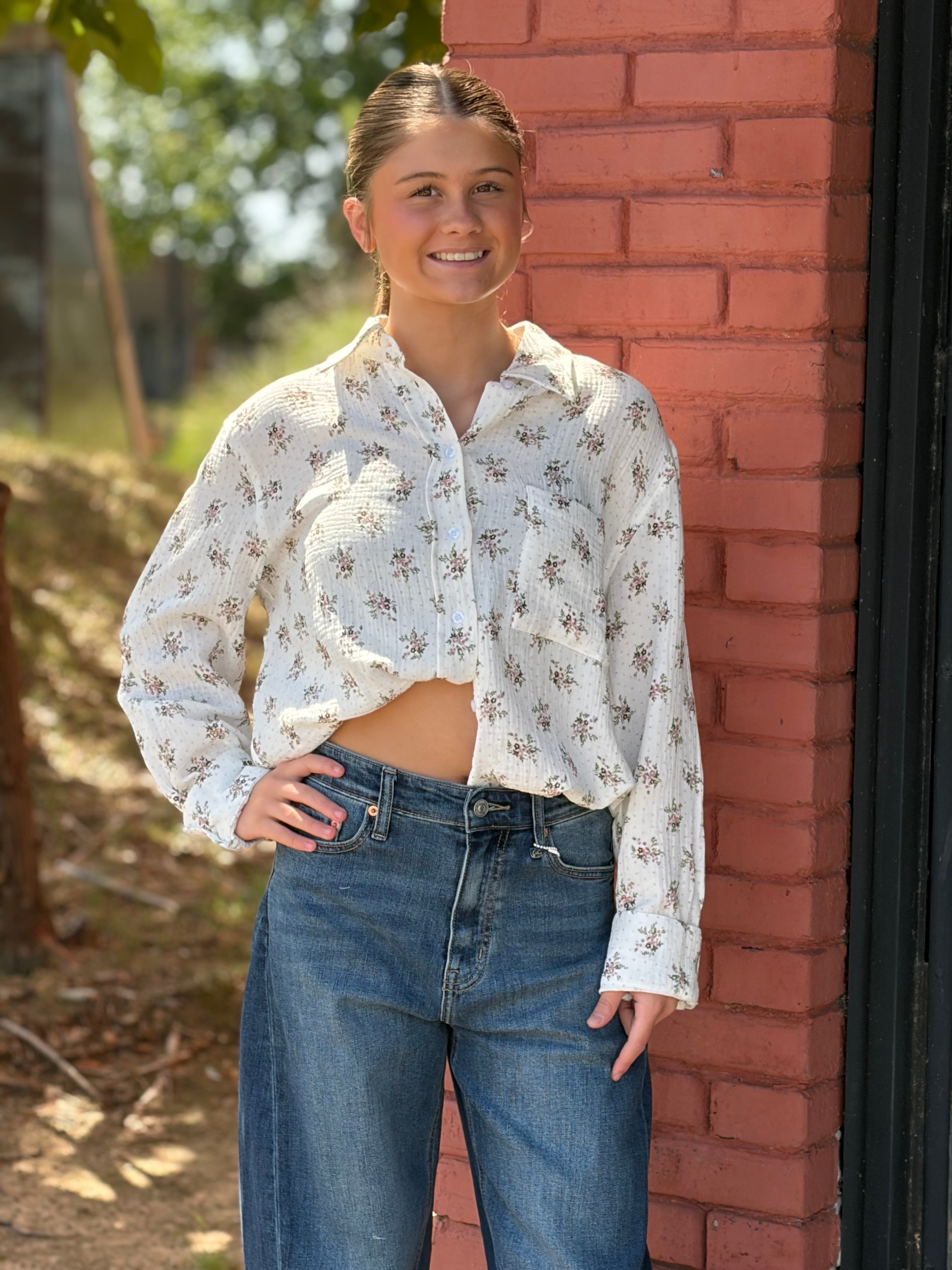 Front, knotted at waist, smiling model + wide-leg jeans