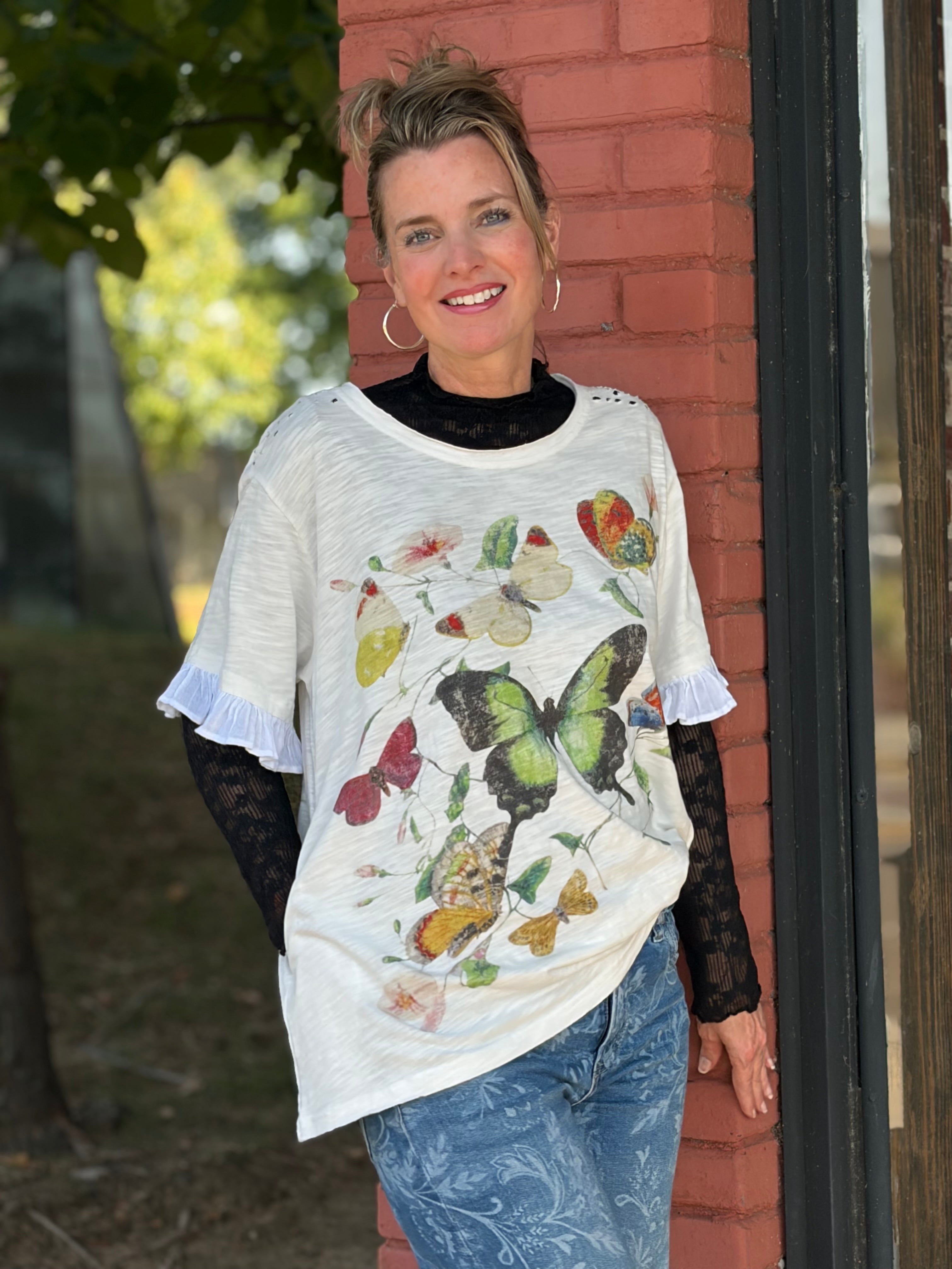 front view with layering and ruffle sleeve detail called out