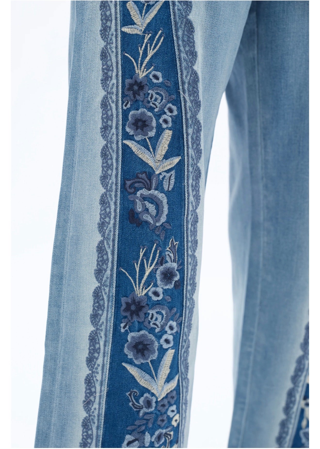 Close up of leg on the Erika Embroidered Patchwork Jean – artisan floral embroidery panel, high-rise wide-leg jean, Spirit & Wind Boutique