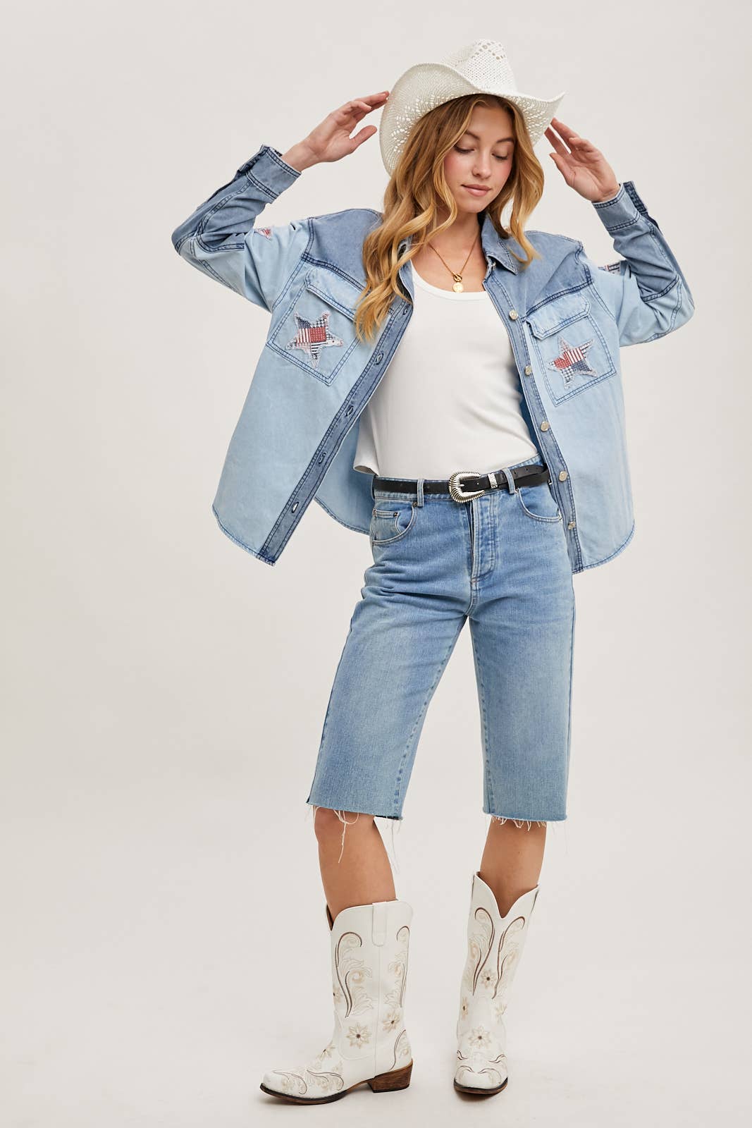 Two-tone denim button-down jacket featuring patriotic star appliqués on pocket and sleeve