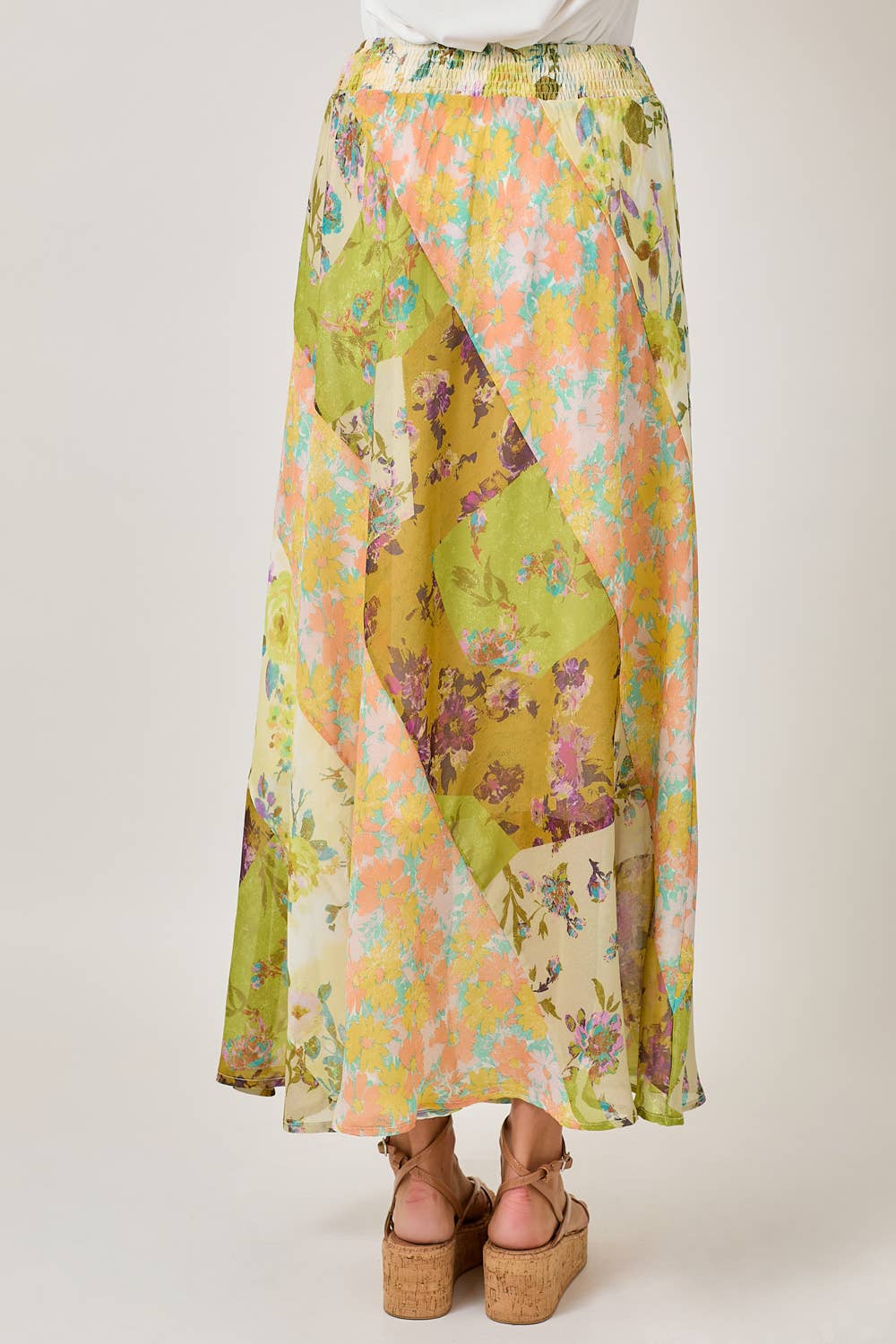 The Citron Mixed Print Skirt - back view of full-length maxi skirt with mixed prints