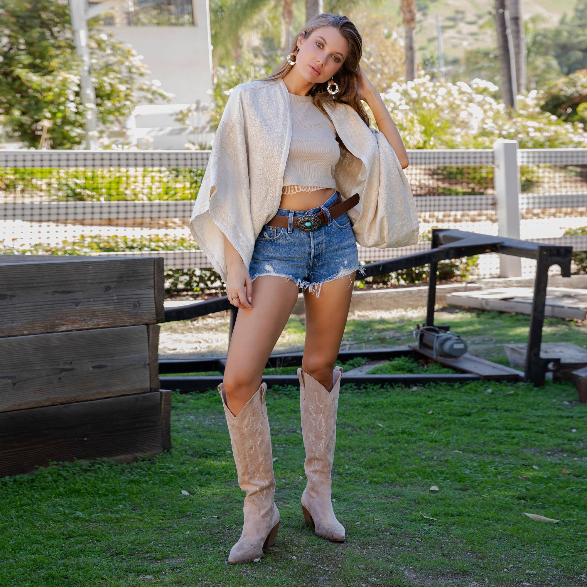 The Nomad Outlined Kaftan Poncho in Natural - fabric drape detail showing lightweight, breathable construction