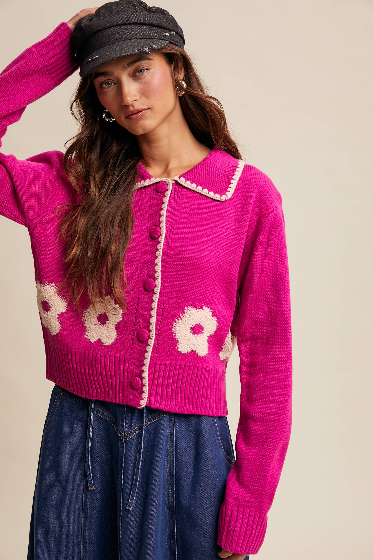 Women’s floral collar knit cardigan with button-front design, soft textured fabric, and contrast flower-patterned collar — stylish layering sweater for everyday wear.