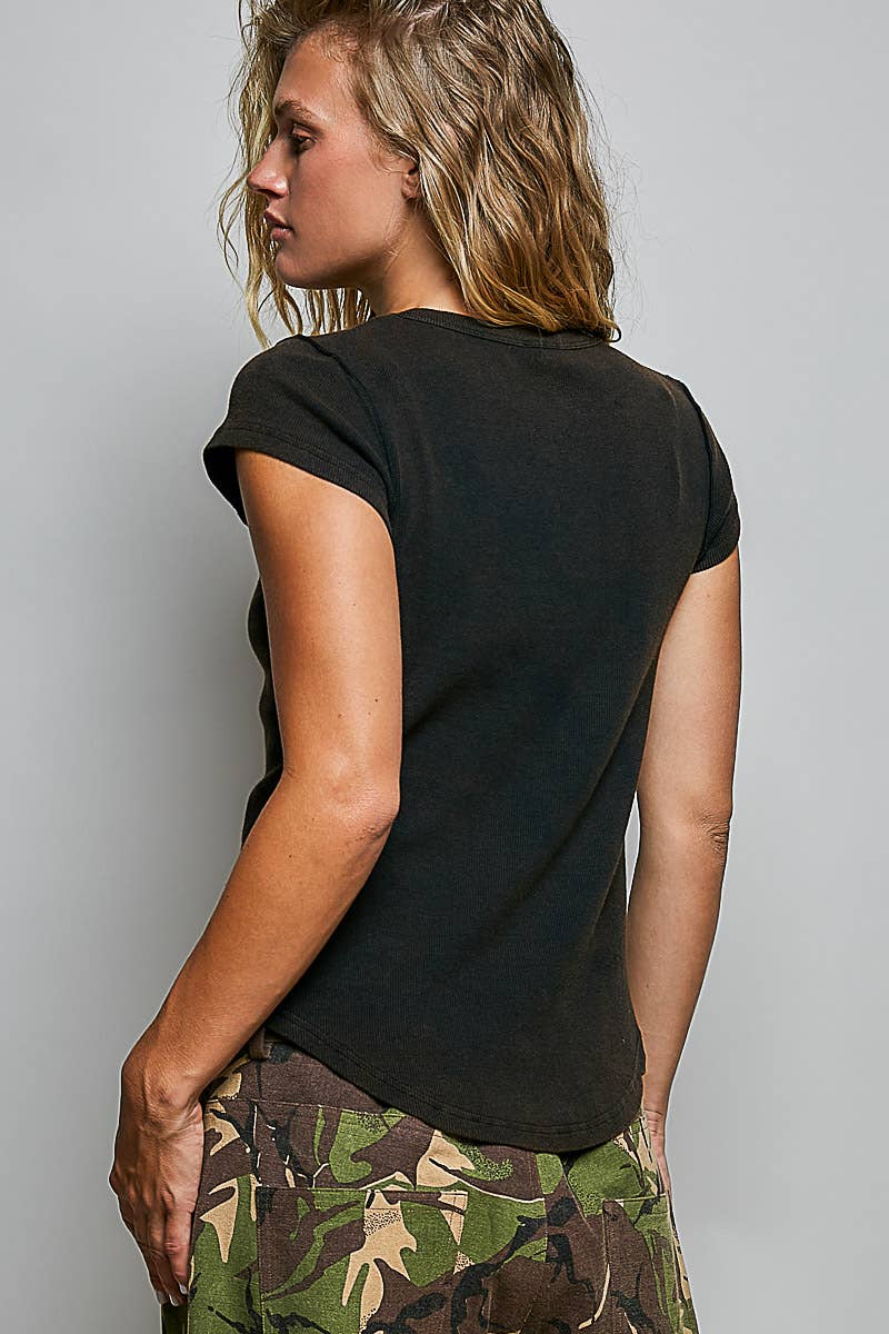 Back view of black artisan stitch curved hem knit top showing curved hem and cap sleeve construction