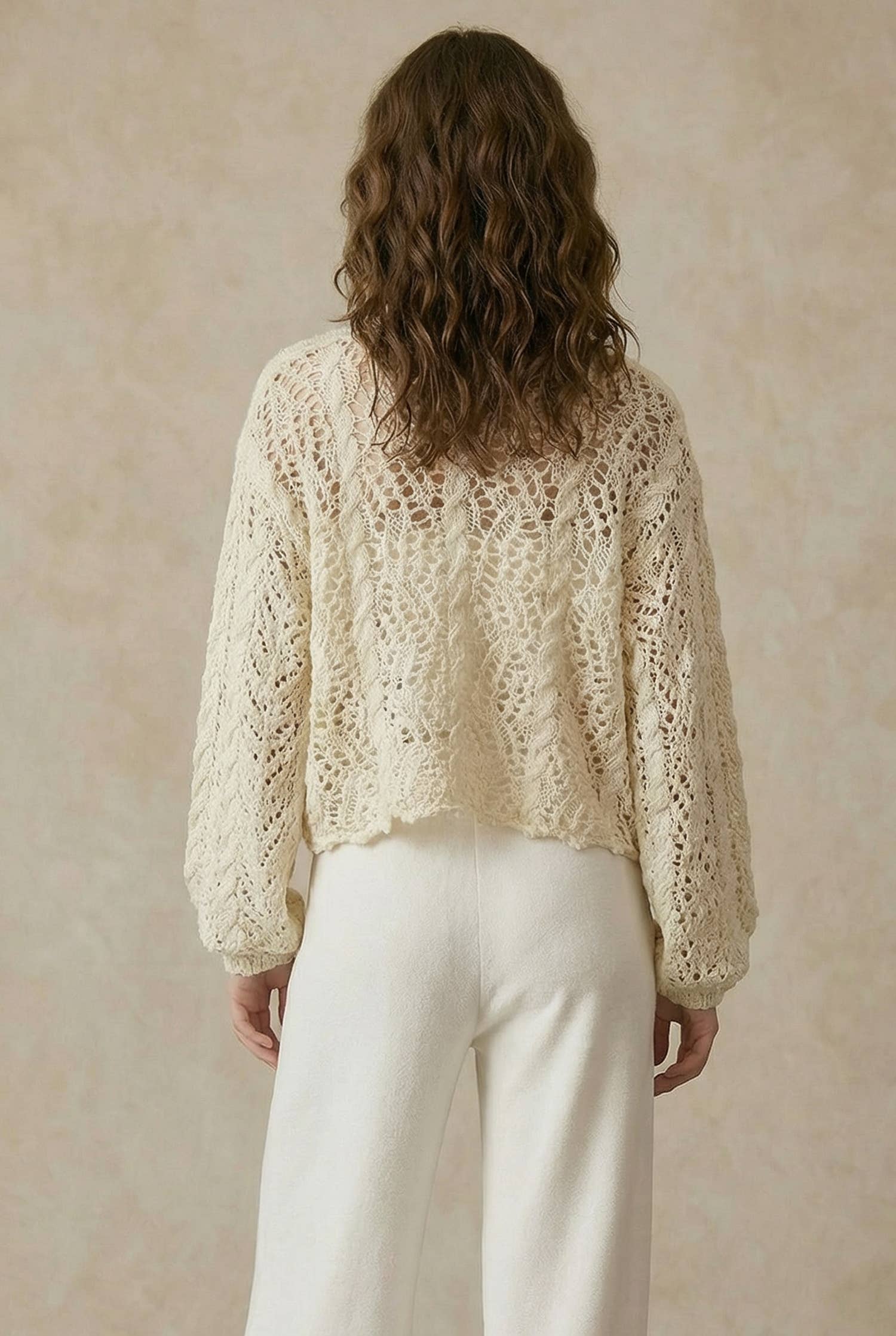 Crochet cardigan close-up - back view pattern with retro boho craftsmanship