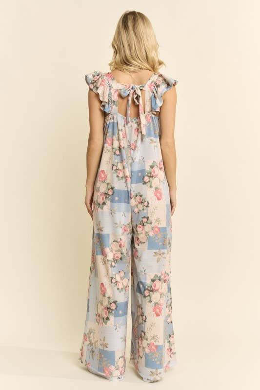 Vintage-inspired blue floral jumpsuit – relaxed bodice and full-length wide-leg silhouette showing back view