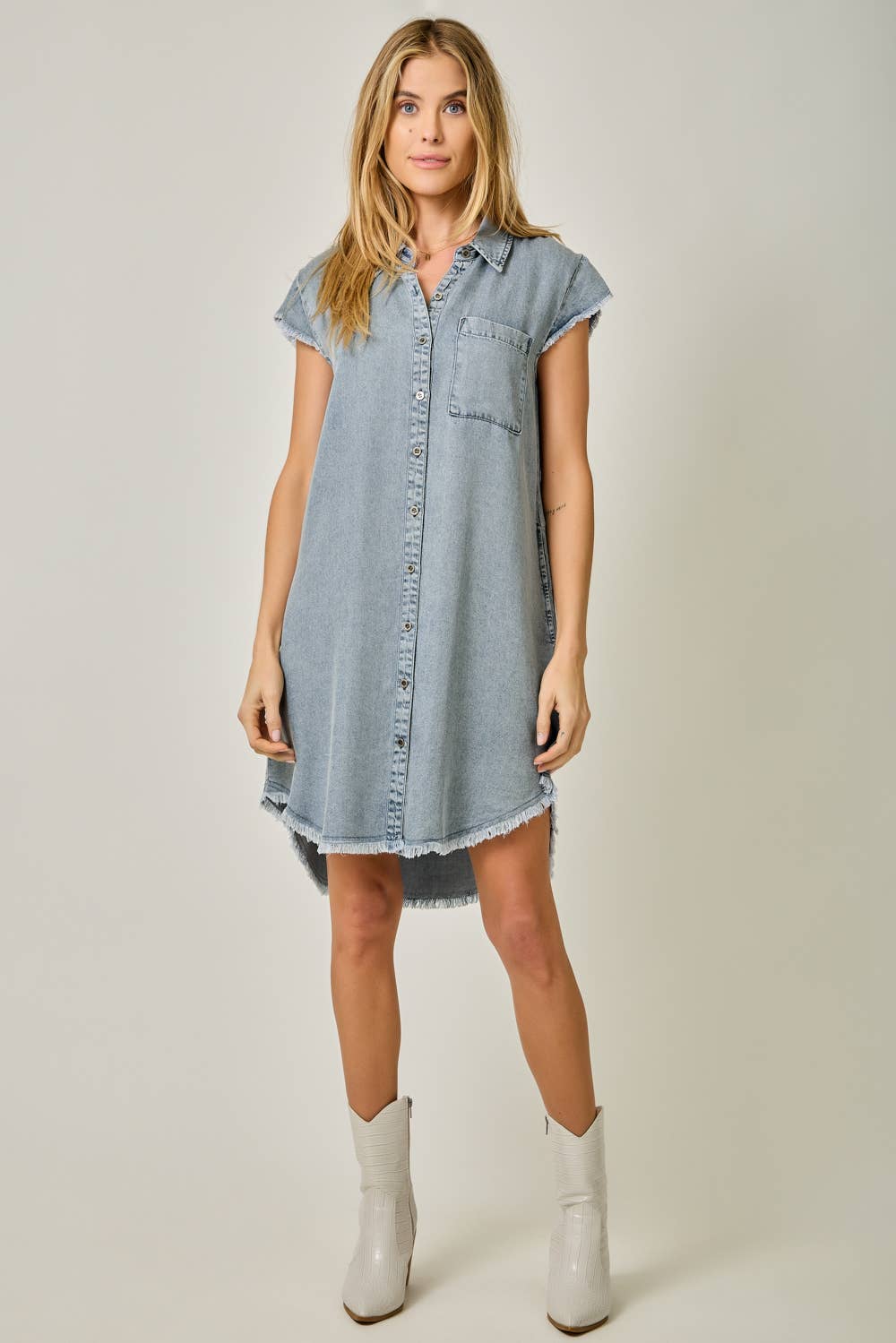 Fringe Hem Tencel Shirt Dress in Light Denim Blue — button-down front, flutter cap sleeves, fringed hi-lo hem, and side pockets