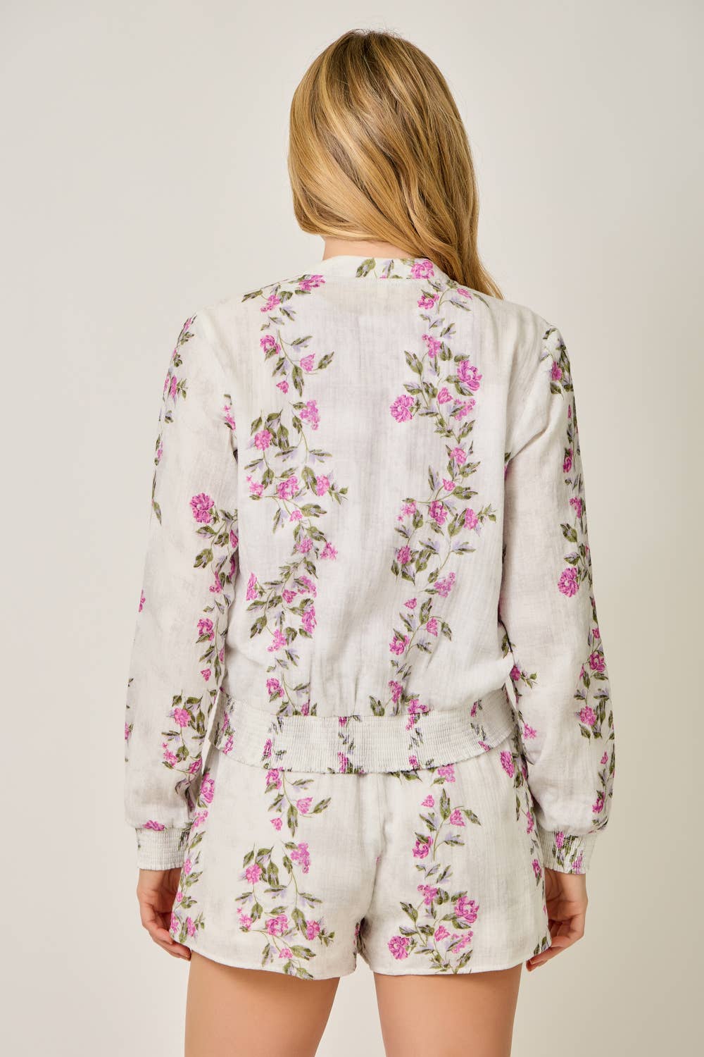 The Rosewood Floral Bomber - back view of bomber jacket with floral print